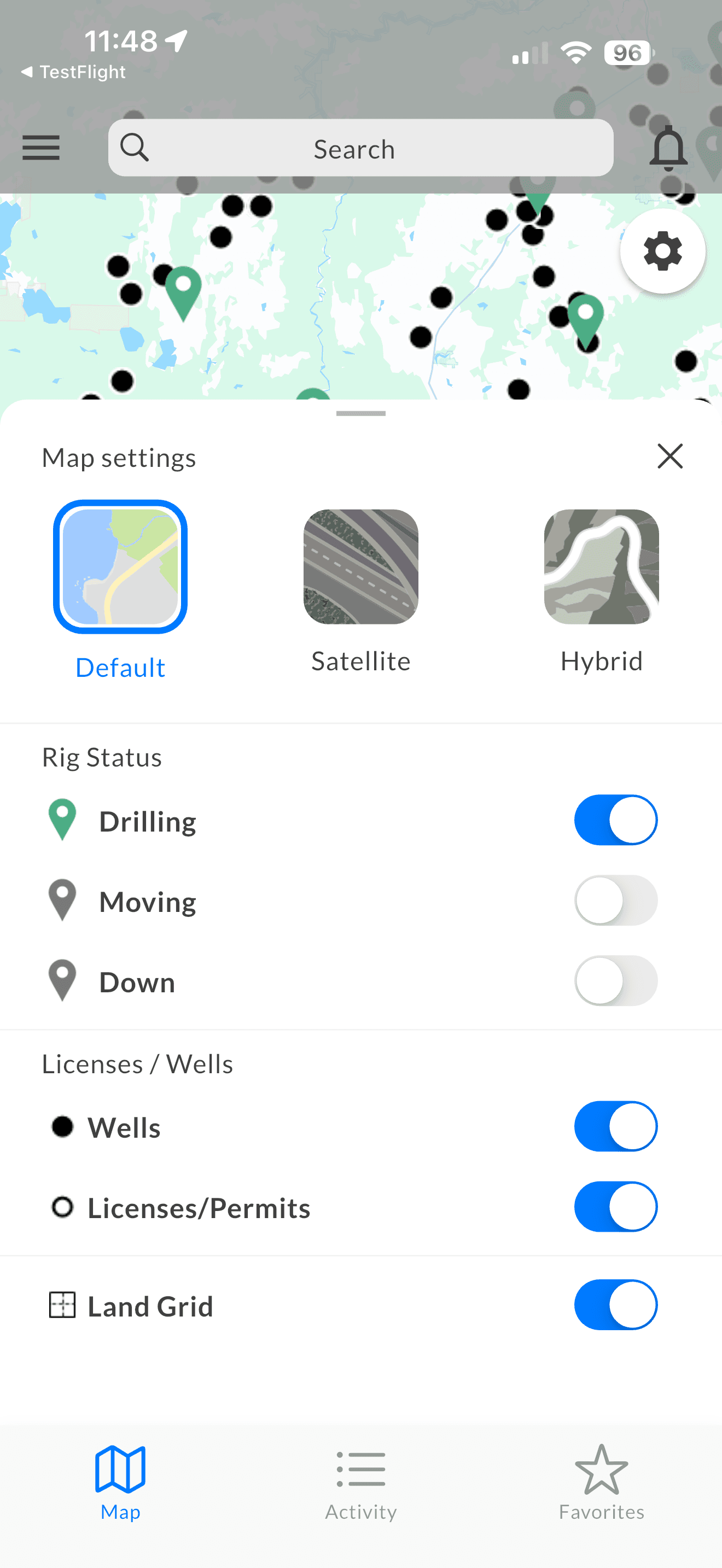 Map settings showing rig status filters for drilling, moving, down, plus wells, permits and land grid toggles